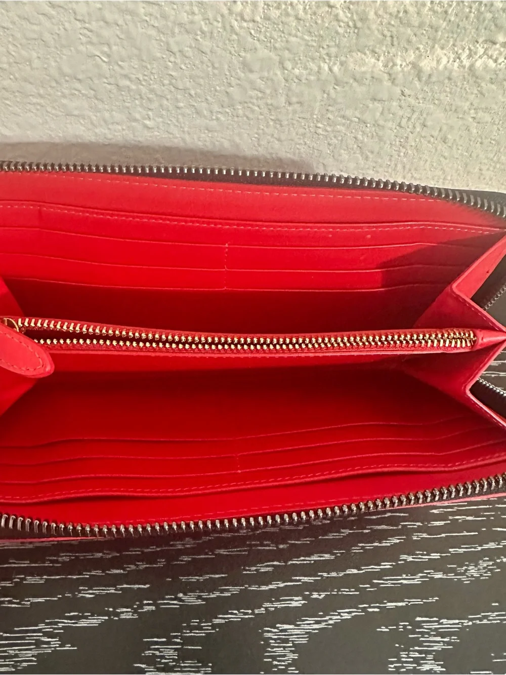 Black Studded Zip-Around Wallet with Red Trim